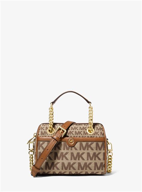 michael kors jacquard duffle bag|Michael Kors travel suitcase.